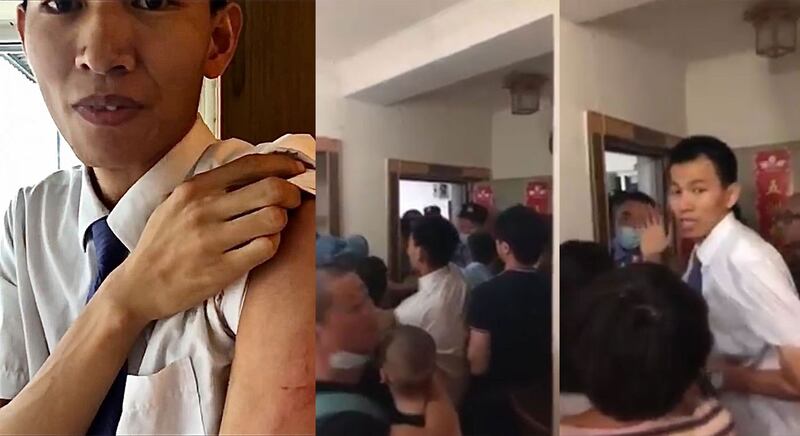 戴志超展示手臂上的伤痕。(视频截图)