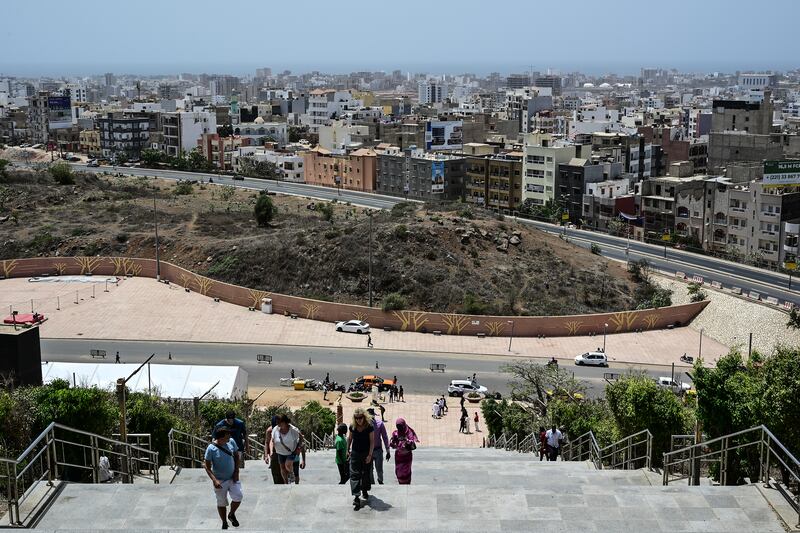 Buildings are seen from Collines des Mamelles at the African Renaissance Monument, outside Dakar, Senegal, in May 2024.