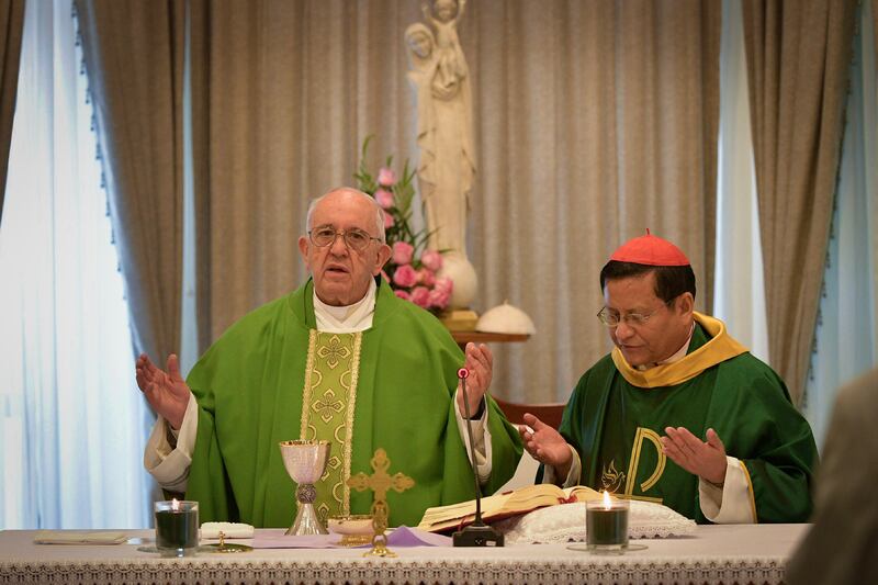 Pope Francis celebrates a Mass with  Cardinal Charles Maung Bo in Yangon, Myanmar, Nov. 28, 2017.