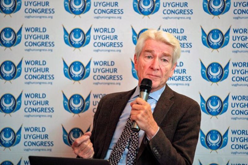 Michael van Walt presents his findings at 20th anniversary commemoration of the World Uyghur Congress in Munich, Germany, May 4, 2024. (Bahram Sintash/RFA)