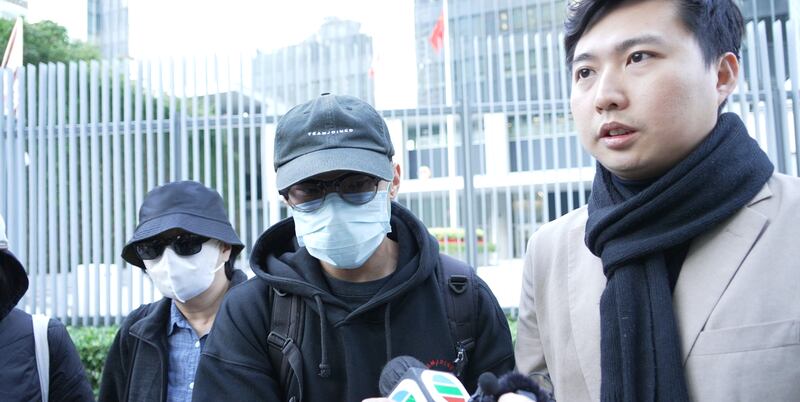 家屬Calvin（圖中）過去兩月曾兩度請願，要求港府及泰國當局營救港人家屬。（衛斯攝）