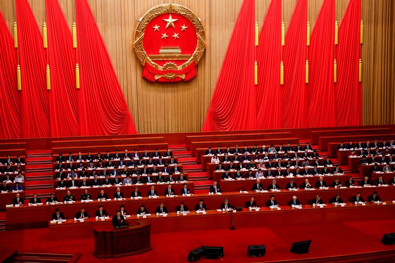 Chinese Premier Li Qiang delivers a speech during the opening session of the National People’s Congress, at the Great Hall of the People, in Beijing, March 5, 2025.