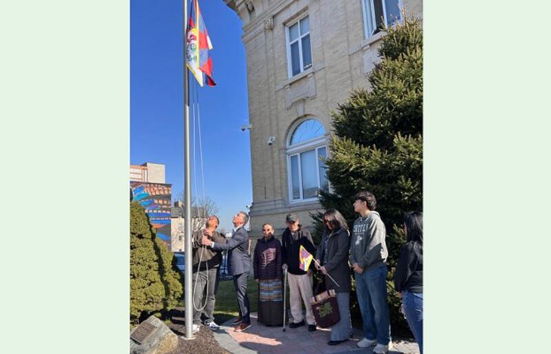 Mayor Michael Melham raises the Tibetan flag outside Belleville Town Hall in honor of the Tibetan New Year, in Belleville, N.J., Feb. 9, 2024. (Courtesy of Township of Belleville, N.J.)