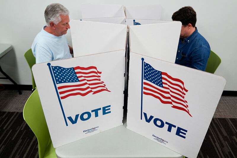 People vote at Tysons-Pimmit Regional Library in Falls Church, Virginia, Oct. 31, 2024.