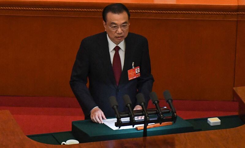 2022年3月5日,中国总理李克强在召开的第十三届全国人大五次会议上发表工作报告。 (法新社)